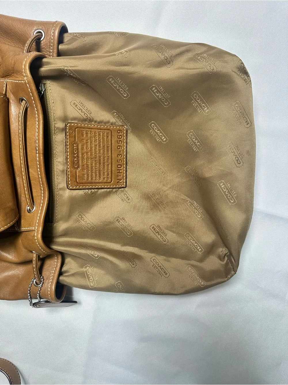 Vintage Coach British Tan Soft Leather Drawstring Backpack with Buckle Flap